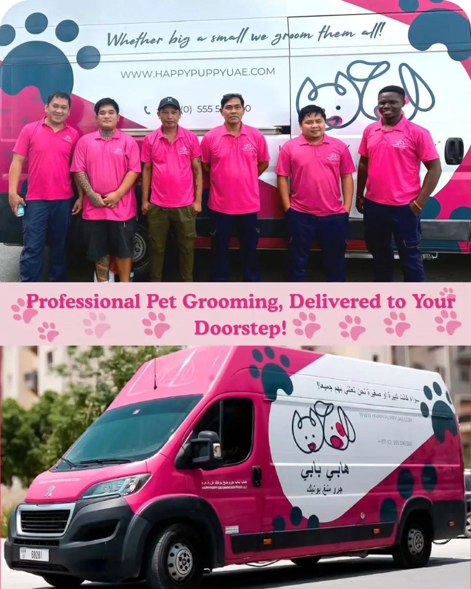 The Happy Puppy grooming team standing with their vans in Dubai